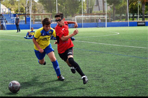 Una jugada del partido del Alevín "A" del C.F. La Nucía ante el Alfàs del Pi